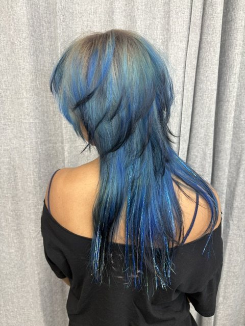Blue and teal ombre melting through dark lengths