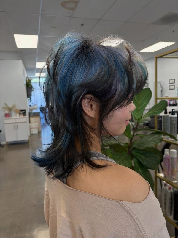 Teal and blue wolf cut with heavy texture