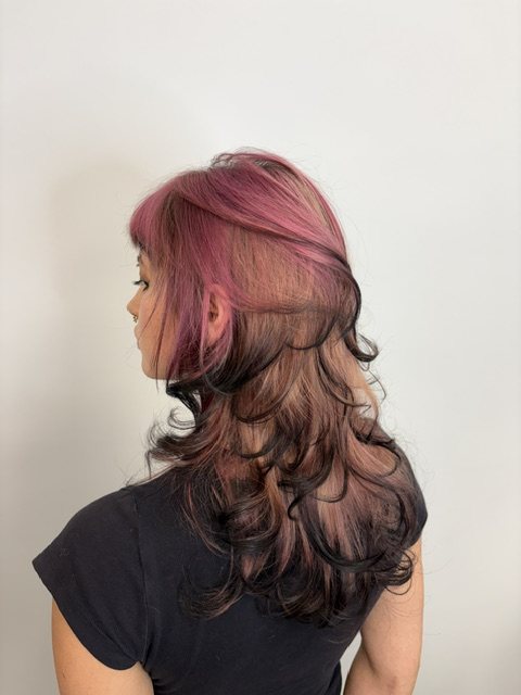Pink face framing on warm brown layers