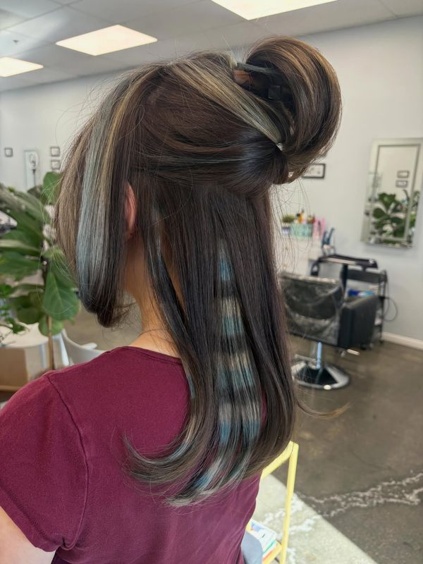 Blonde money piece with a teal peekaboo panel underneath