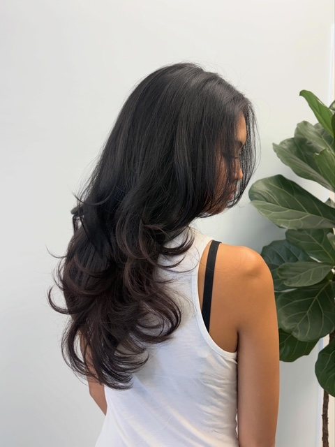Long dark layers finished with a smooth blowout, side view