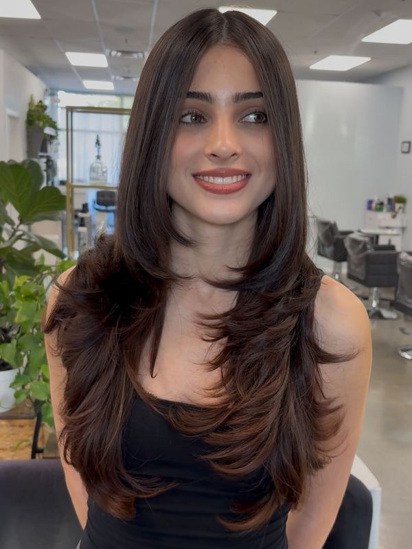 Long layers with a face framing curtain
